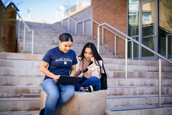 UCR students studying near stairs