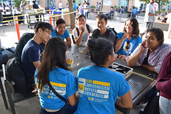 Group of international students playing games