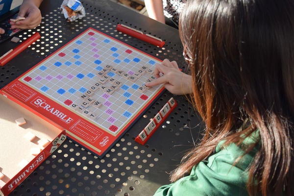 UCR international students playing scrabble