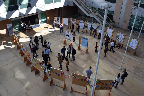 Overhead shot of scholar research poster display near UCR's Winston Chung Hall