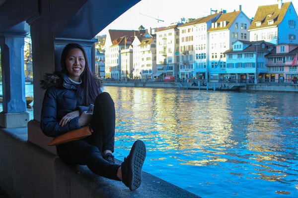 Female UCR student posing by water in Copenhagen