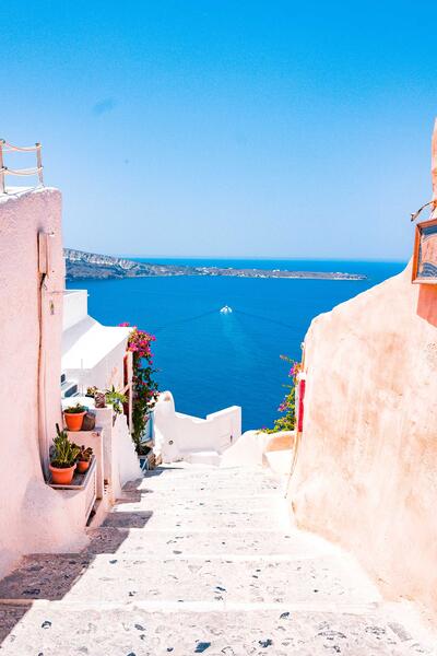 Photo of stairs leading to water in Santorini, Greece (c) Ryan Spencer unsplash