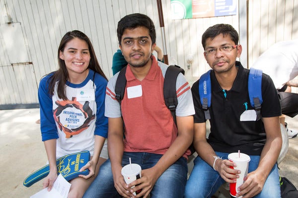 Three UCR students resting during move in day
