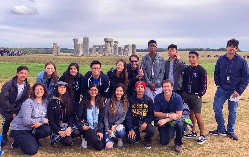 group photo of students at Stonehenge